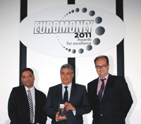 Adel El-Labban receives his award from Clive Horwood (r) and Sudip Roy