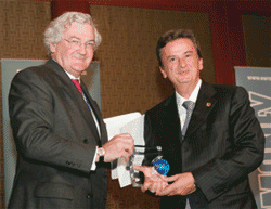 Riad Salame receives his central bank governor of the year award from Euromoney’s chairman and editor-in-chief, Padraic Fallon, in Singapore in September