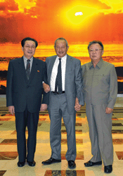 Not so lonely: Jang Song Thaek, vice chairman of the National Defense Commission, Naguib Sawiris and Kim Jong Il