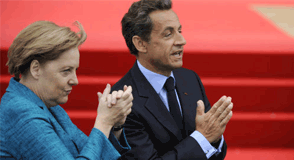 French President Nicolas Sarkozy, right, and German Chancellor Angela Merkel 