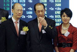 Against the odds: Stanley Ho (centre), chief executive Ambrose So and Ho’s wife, Angela Leong On Kei, at the listing ceremony of SJM on July 16