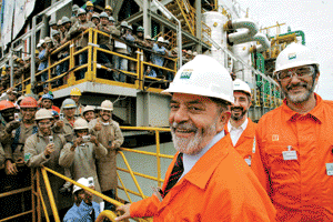 Brazil's President Luiz Inacio Lula da Silva (centre) Jose Grabielli (right), president of Petrobras