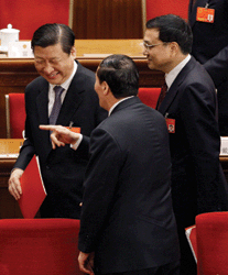 Is a power vacuum around the expected ascension to power of Li Keqiang (r) and Xi Jinping (l) leading local leaders to make commitments they cannot keep?