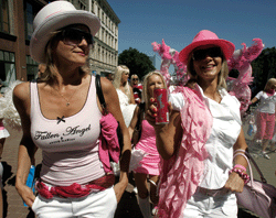 Revellers walk during the 