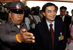 Instability: Thai prime minister Abhisit Vejjajiva arrives at parliament in Bangkok on March 19. The main opposition party began a censure debate against Abhisit and other ministers, knowing it would not win but hoping its allegations would stick with the public