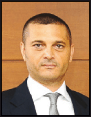 Tolga Egemen (TE) has been an executive vice-president at Garanti Bank since October 2000