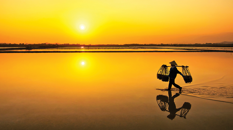 Salt farmer after wholeday working, Hon Khoi,Nha Trang,Vietnam