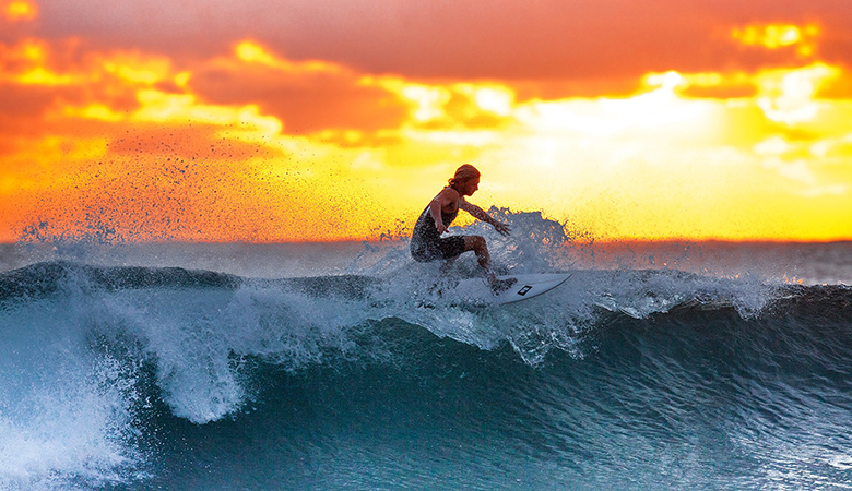 surfer-wave-sun-780