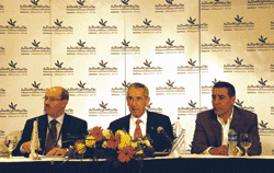 A fresh start: PIC-Palestine CEO Dr. Hassan Abu Libdeh (r); minister of national economy Kamal Hassouneh; and minister of information Ryad Malki 